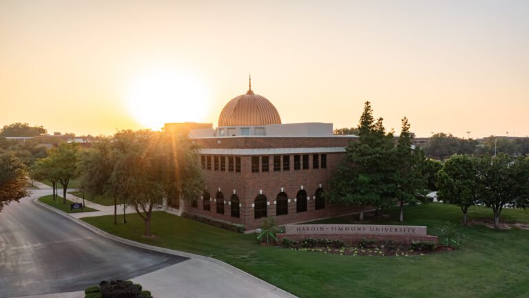 The Skiles Building with the sun rising.