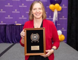 Dr. Jill Jumper with her award.