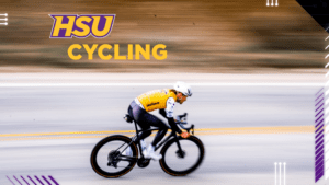 A photo of a cyclist wearing an HSU jersey.