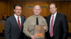 Ryan Hunter pictured in the middle receiving an award for the Southeastern Association of Fish and Wildlife Agencies Office of the Year